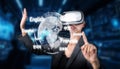 Smart manager touching and managing system while using VR glasses. Contraption. Royalty Free Stock Photo