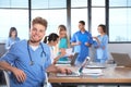 Smart medical student with his classmates Royalty Free Stock Photo