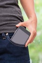 Smart mobile phone in jeans pocket Royalty Free Stock Photo