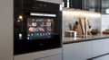Smart oven in a modern kitchen Showcasing the oven\'s touchscreen interface Royalty Free Stock Photo