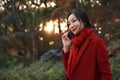 Smart phone Autumn woman talking on mobile in fall Royalty Free Stock Photo