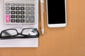 smart phone, calculator, ballpoint pen, empty notebook, eyeglass Royalty Free Stock Photo