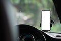 Smart phone in car windshield holder for map gps navigation. Blank screen for your advertise text Royalty Free Stock Photo