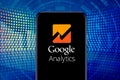 Smart phone with the Google Analytics logo is a web analytics tool from Google. Royalty Free Stock Photo