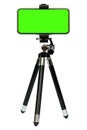 Smart phone of green screen on tripod isolated on white background with clipping path Royalty Free Stock Photo