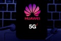 Smart phone with the logo of Huawei and 5G. The 5g are new communication technologies that Huawei