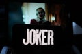 Smart phone with the logos of the JOKER 2020 movie. Joker known as Joker in Latin America