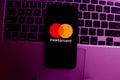 Smart phone with the Mastercard logo that is a brand of credit and debit cards. United States, New York, Thursday, October 4, 2020 Royalty Free Stock Photo