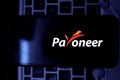 Smart phone with the Payoneer logo is a financial