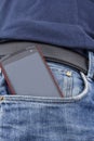 Smart phone in a pocket. Royalty Free Stock Photo