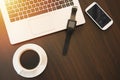 Smart phone watch and laptop with coffee Royalty Free Stock Photo