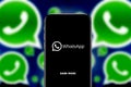 Smart phone with the whatsapp logo dark mode