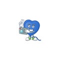 Smart Photographer blue love balloon cartoon mascot with a camera