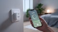 Smart plug controlled by smartphone in modern bedroom Royalty Free Stock Photo
