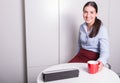 Smart professonal woman is having a coffee break in the office