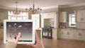 Smart remote home control system on a digital tablet. Device with app icons. Interior of classic white and wooden kitchen in the b