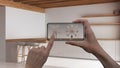 Augmented reality concept. Hand holding smart phone with AR appl