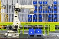 Smart robot with automatic arm grip system for carry arrange product box to conveyor line and storage on shelf at warehouse Royalty Free Stock Photo