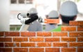 Smart robot industry 4.0 arm brick building construction human force remote Royalty Free Stock Photo