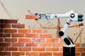 Smart robot industry arm brick building construction human force remote wifi Royalty Free Stock Photo