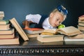 Smart school girl reading a book at library Royalty Free Stock Photo