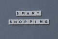 ' Smart Shopping ' word made of square letter word on grey background