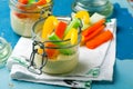 Smart snacking pack veggies dip together in a jar Royalty Free Stock Photo