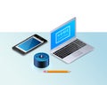 Smart speaker for smart home control. Modern laptop, a mobile phone, pencil. Royalty Free Stock Photo