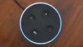 Smart speaker top view artificial intelligence assistant voice control blue ring button activation