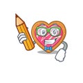 A smart Student cookie heart character holding pencil