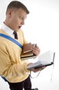 Smart student managing his books Royalty Free Stock Photo