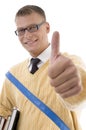 Smart student wearing spectacles with thumbs up