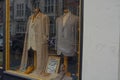 Smart Suits in fashion clothing boutique window