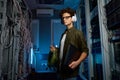 Smart teenager student having internship in modern data center Royalty Free Stock Photo