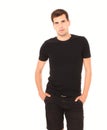 Smart thinking young man in black blank template shirt isolated on white. Copy space. Front view