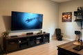 smart tv with streaming content, surround sound system, and gaming console Royalty Free Stock Photo