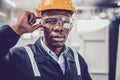 Smart and Visionary farsight worker concept. African black male clever engineer worker looking focus Royalty Free Stock Photo