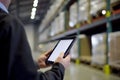 Smart warehouse management system. Worker hands holding tablet. Neural network AI generated Royalty Free Stock Photo