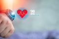 Smart watch with icon heart rate on manÃ¢â¬â¢s hand. The concept of technology healthcare and check health Royalty Free Stock Photo