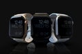 3 smart watches - Apple Watch 4, all colors, on black