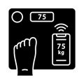 Smart wireless body scales glyph icon