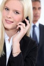 Smart woman using a cellphone Royalty Free Stock Photo