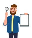 Smart young bearded man showing/holding magnifying glass and blank or empty clipboard/document/report in hand. Search, find.