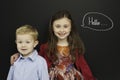 Smart young children infront of a blackboard