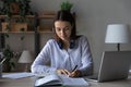 Smart young woman handwrite study distant at home