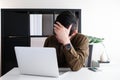 Smart youngadult 40s asian man with eye glasses working on laptop or computer notebook in modern working space. office life and