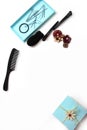 Smartphone Accessories and hair pins flat lay. Sponge for hair, hairdo babette. necklaces of beads or flowers, tiffany