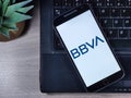 Smartphone with bank BBVA logo on the screen. Banco Bilbao Vizcaya Argentaria is a Spanish banking group. Royalty Free Stock Photo