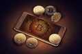 Smartphone with Bitcoin on-screen among piles of Bitcoins. Bitcoin in danger concept. Royalty Free Stock Photo