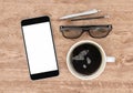 Smartphone with blank screen and coffee cup on wooden office desk, top view, workspace design, 3d rendering Royalty Free Stock Photo